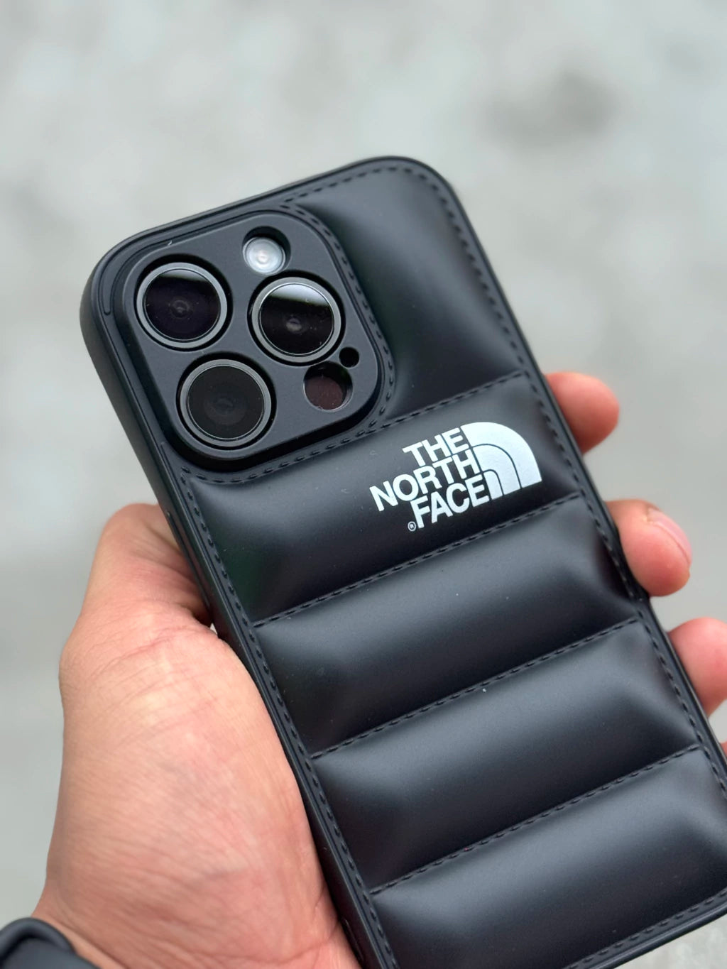FUNDA PARA IPHONE PUFFER JACKET TNF